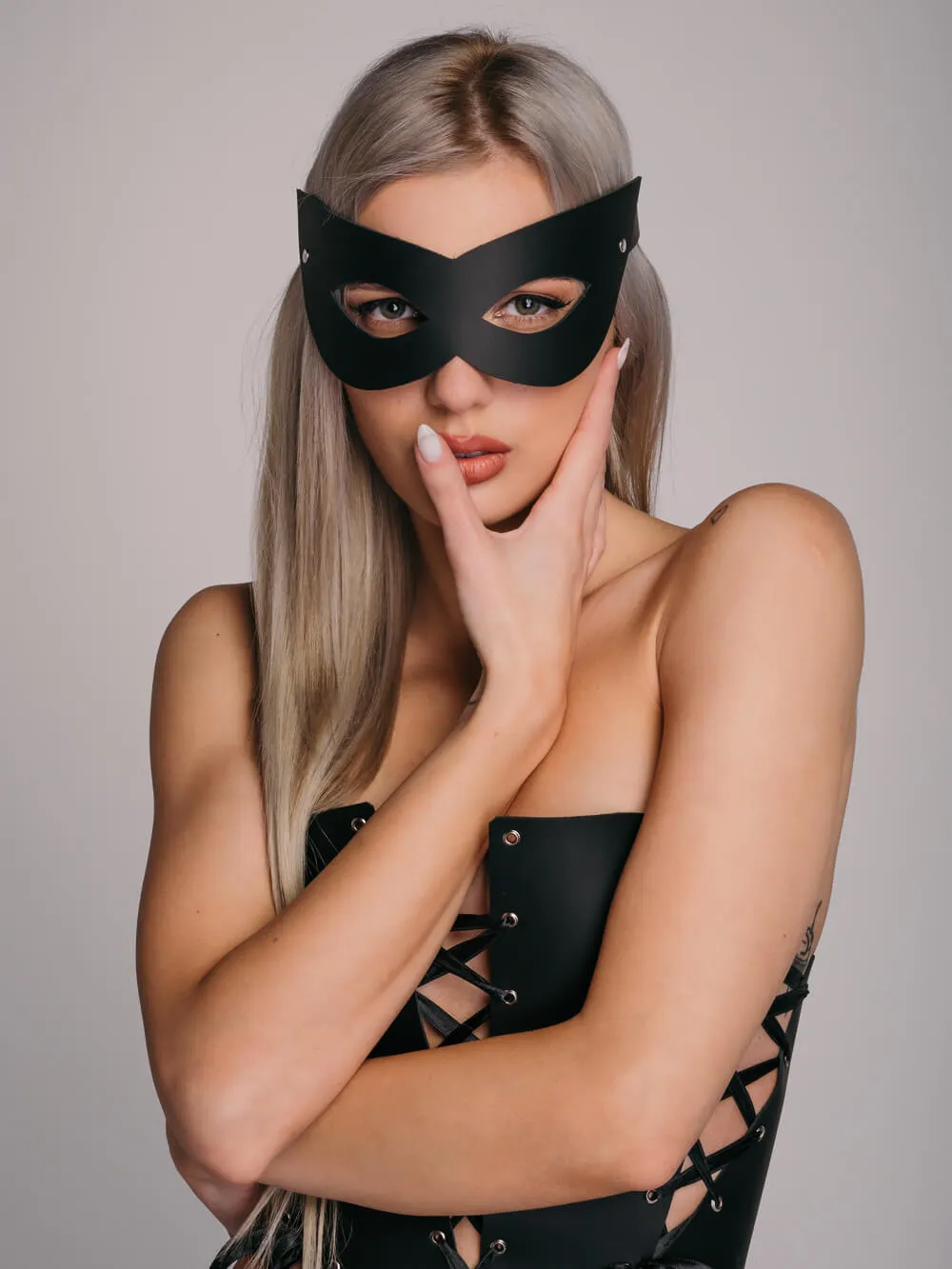 Sexy leather party eye mask. BDSM accessory and party costume.