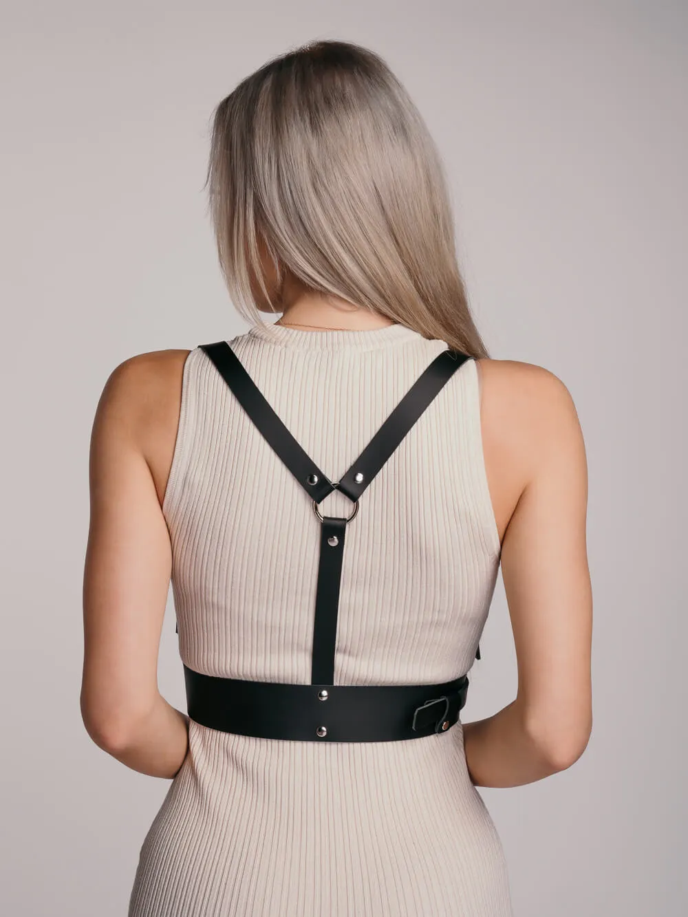 Handmade Erica harness suspenders from natural Italian leather. Massive belt with asymmetrical buckle and Y-back.