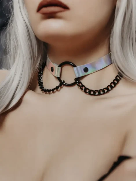 Neon Dream leather choker in hologram color with black ring and chains.