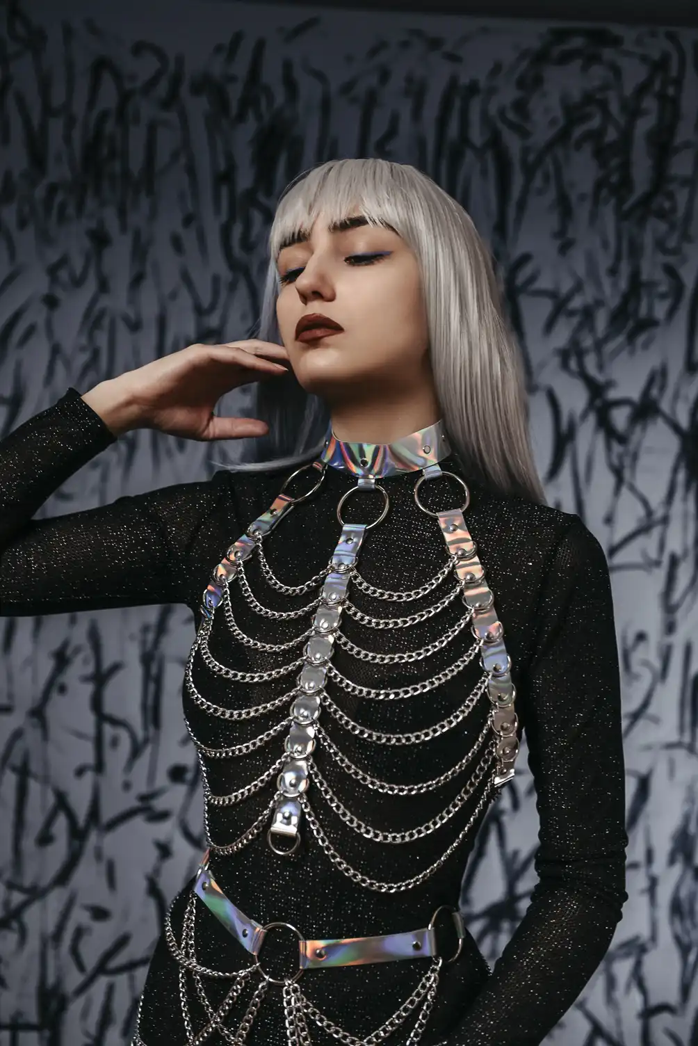 Extravagant Astral body harness accessory in natural holographic leather with chains and chains.