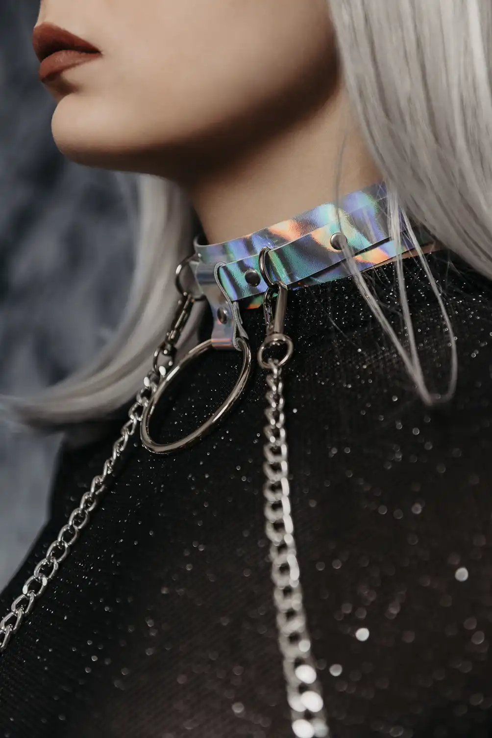 Leather hologram choker set and 2 bracelets linked by removable chains.