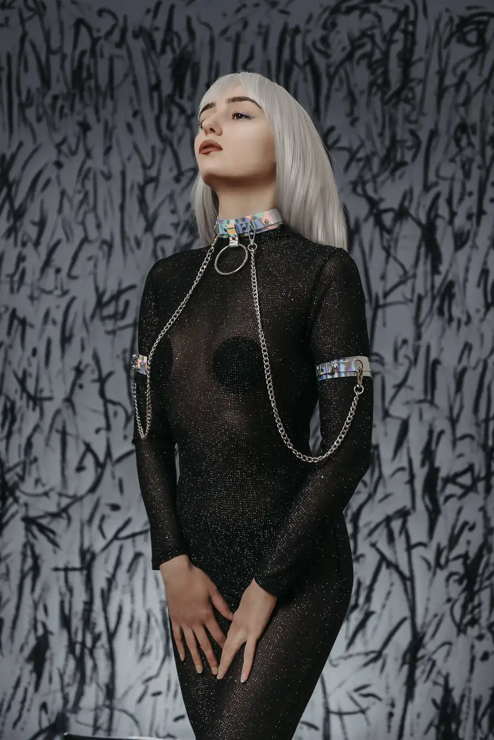 Leather hologram choker set and 2 bracelets linked by removable chains.