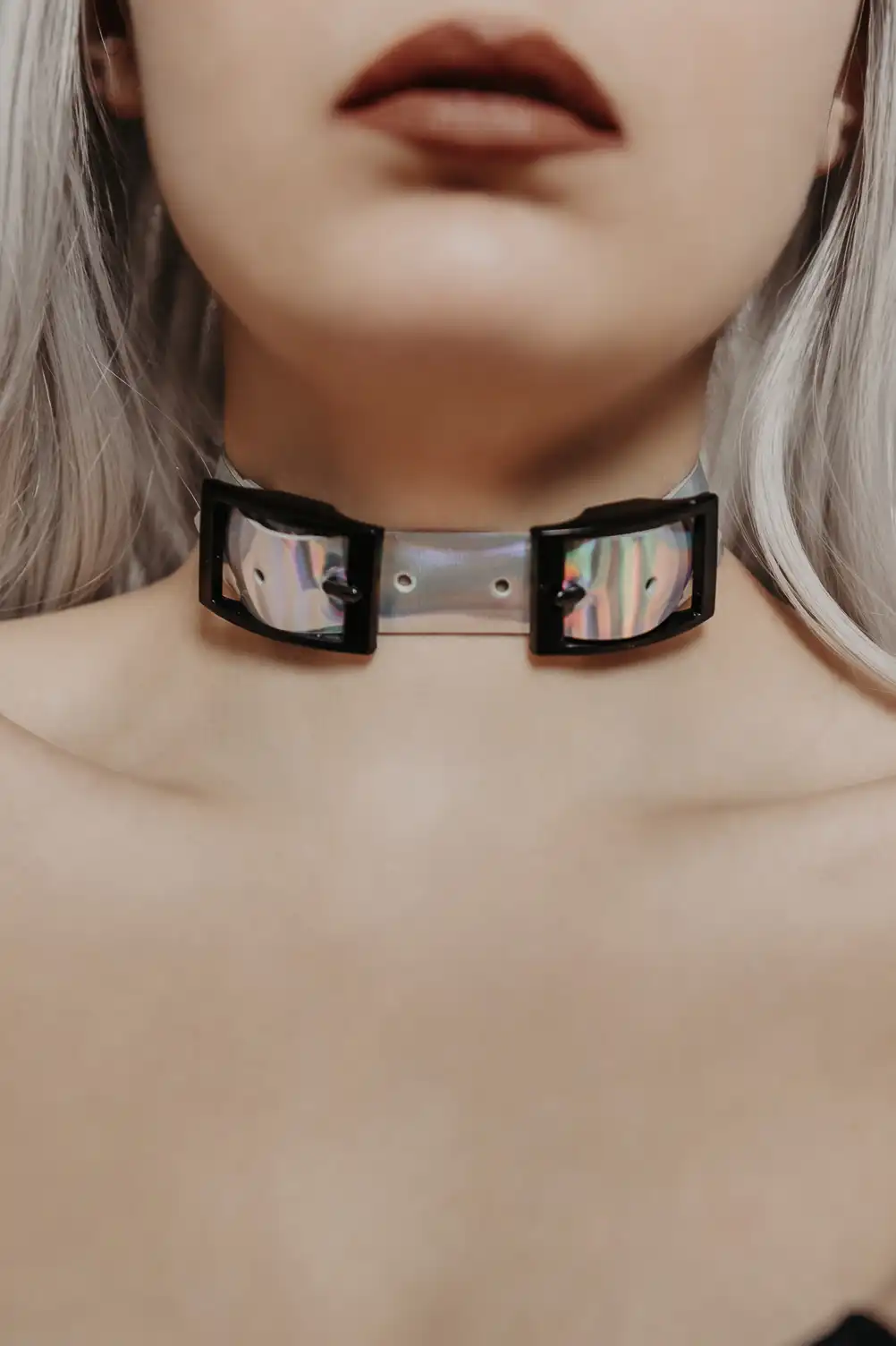Handmade leather choker with black buckles. High-class genuine leather in hologram color.